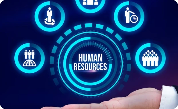 A digital graphic with the text "HUMAN RESOURCES" in the center, surrounded by circular icons depicting concepts like teamwork, time management, and global collaboration, all in blue tones. A hand reaches toward the design, emphasizing interaction with the concept.